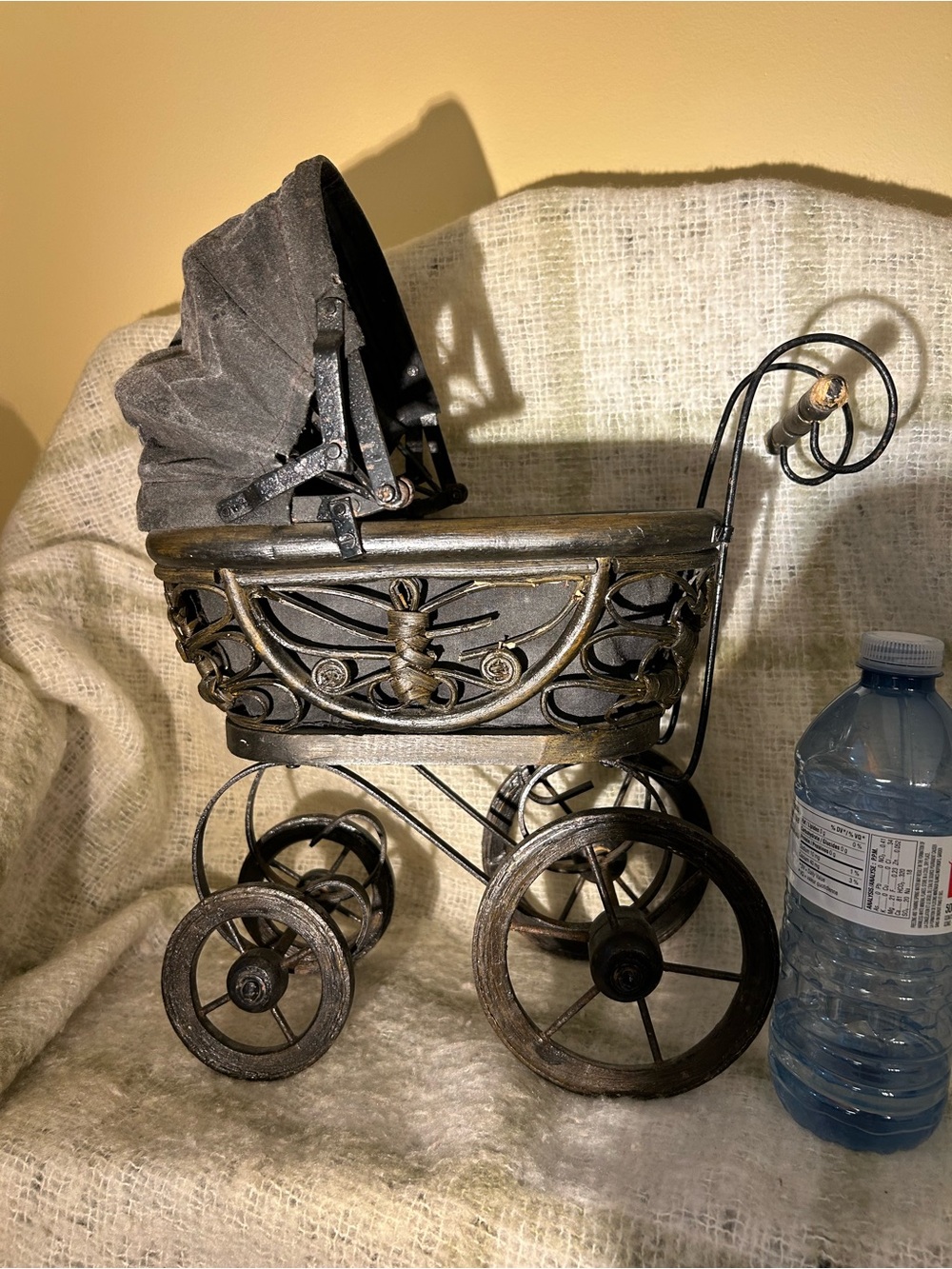 Antique Black and Dark Rattan , metal wood and fabric Decorative Doll Carriage.
